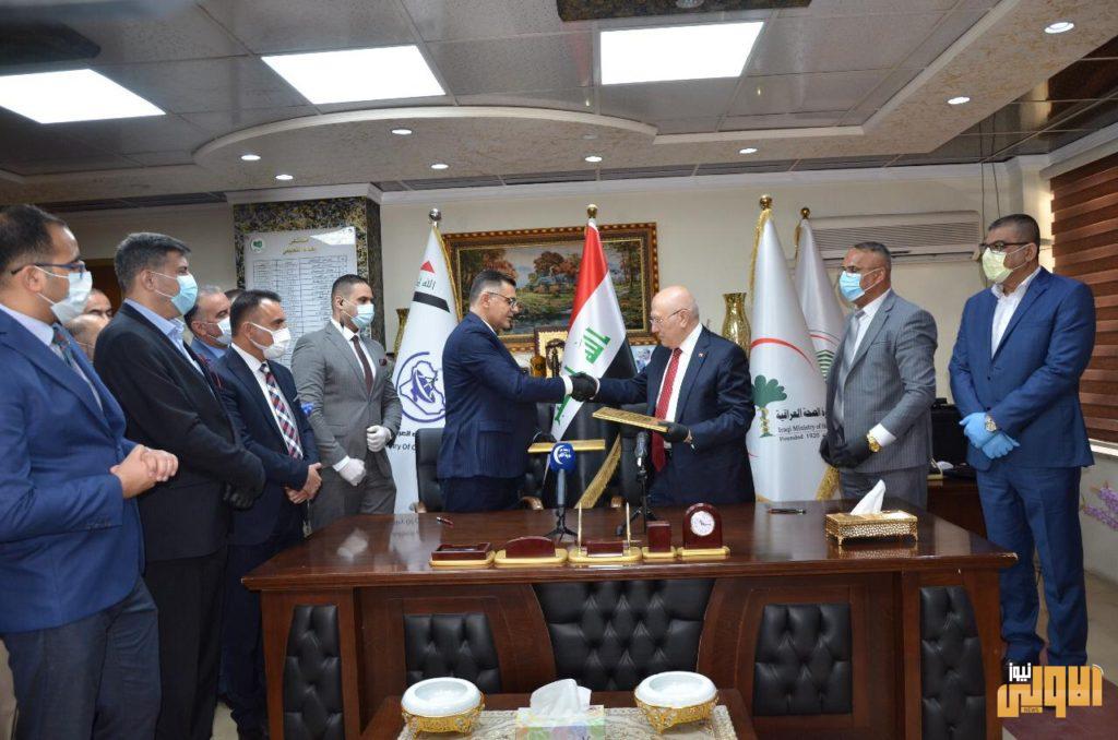 الربيعي وعلاوي يوقعان مذكرة تفاهم مشترك بين وزارتي الاتصالات والصحة 6 IMG 20200506 WA0056