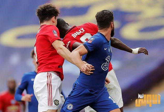 30948980 8538825 Manchester United team mates Eric Bailly and Harry Maguire clash m 38 1595183508863