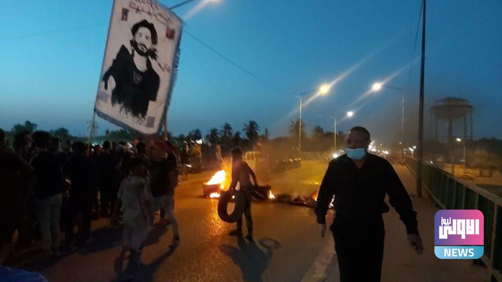 متظاهرو الناصرية يقطعون جسر النصر بالإطارات المشتعلة 8 IMG 20210525 WA0085