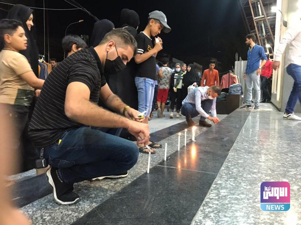 ايقاد الشموع على ارواح ضحايا تفجير الكرادة بعد القبض على الارهابي الزوبعي (صور) 10 A125C991 9CF8 4CD5 B963 21B2EEFEF53B